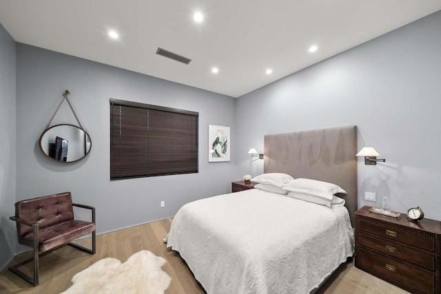 bedroom with light wood-type flooring