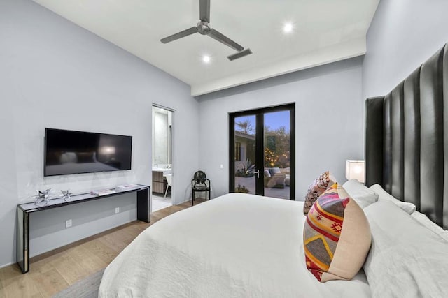 bedroom with connected bathroom, ceiling fan, access to outside, and light hardwood / wood-style flooring