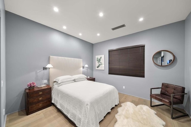 bedroom featuring light hardwood / wood-style flooring