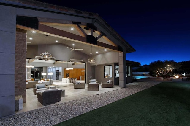 patio at night with outdoor lounge area