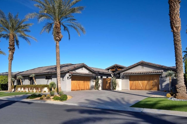 view of front of home with a garage