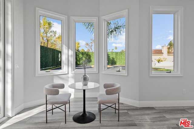 dining area featuring light wood-type flooring