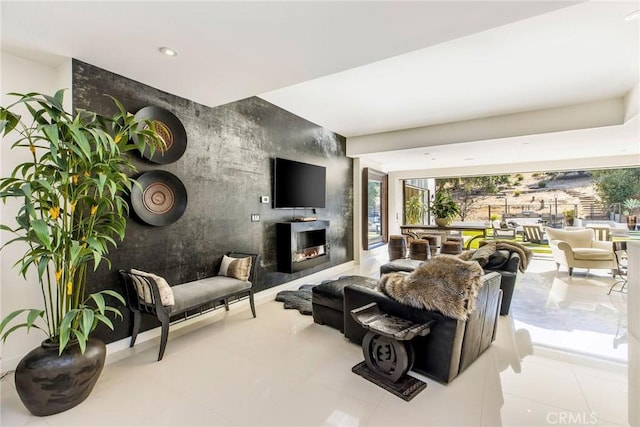 tiled living room with a large fireplace