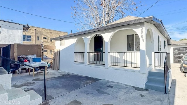 exterior space with a porch