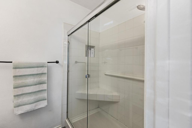 bathroom with walk in shower