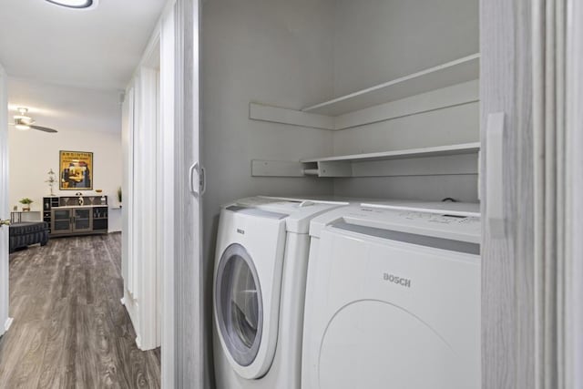 laundry room featuring washer and clothes dryer, ceiling fan, and dark hardwood / wood-style floors