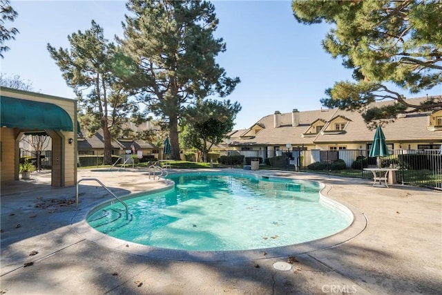 view of pool featuring a patio area