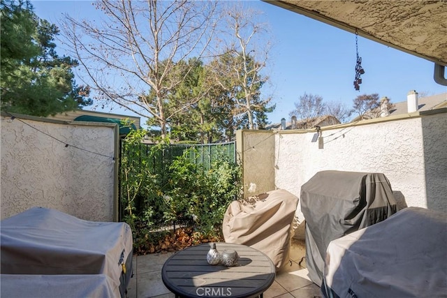 view of patio / terrace featuring a grill