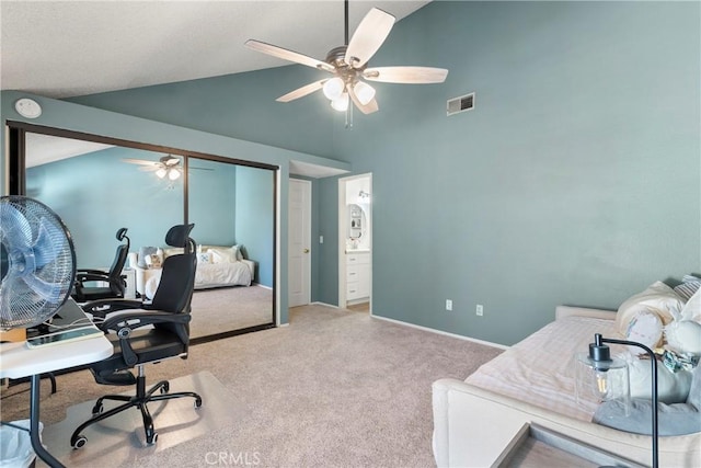 home office featuring high vaulted ceiling and light colored carpet