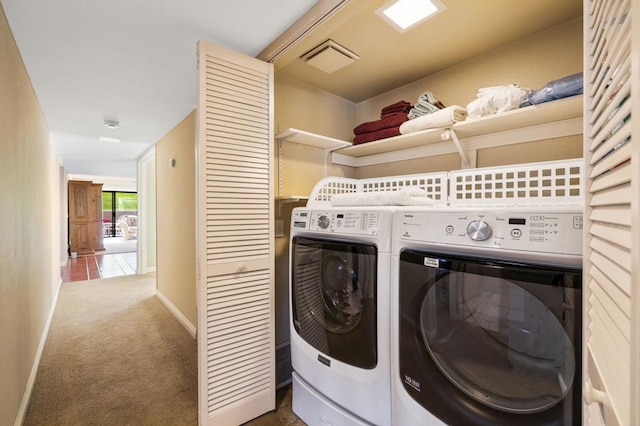 clothes washing area with carpet and independent washer and dryer