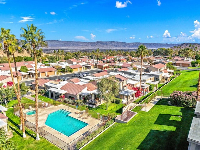 drone / aerial view featuring a mountain view