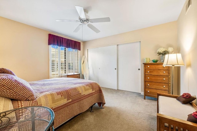 bedroom featuring ceiling fan and carpet flooring