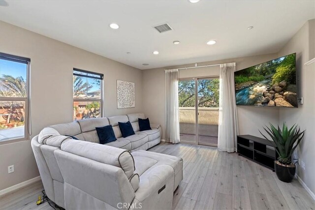 living room featuring light wood-type flooring