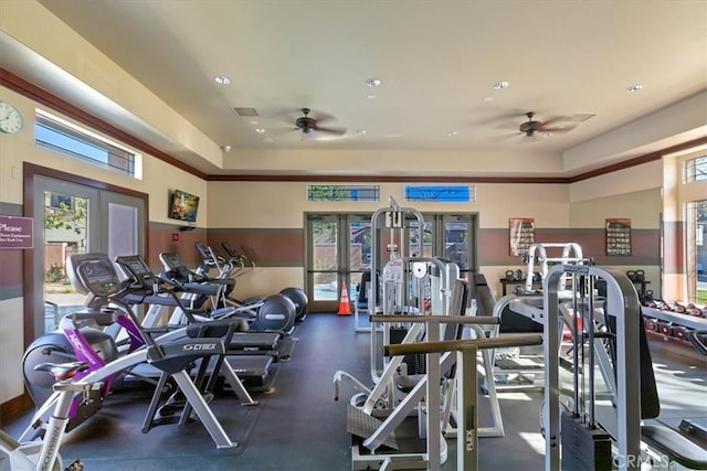 workout area featuring ceiling fan and french doors