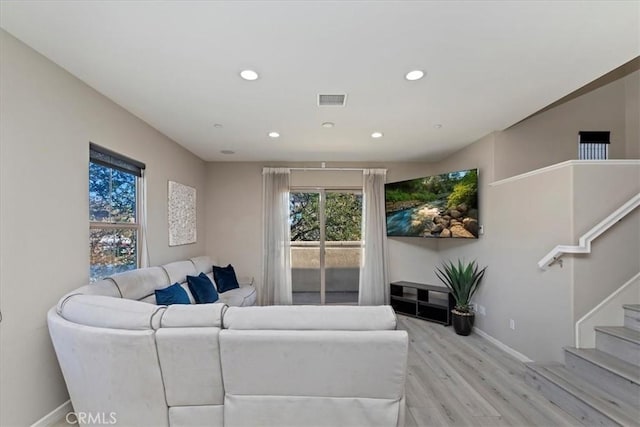 living room featuring light wood-type flooring