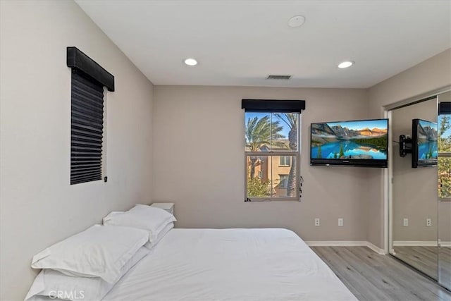 bedroom featuring light hardwood / wood-style floors