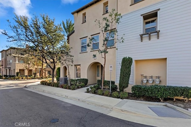 view of front of house with central AC unit