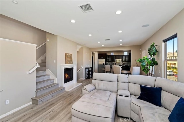 living room featuring light wood-type flooring