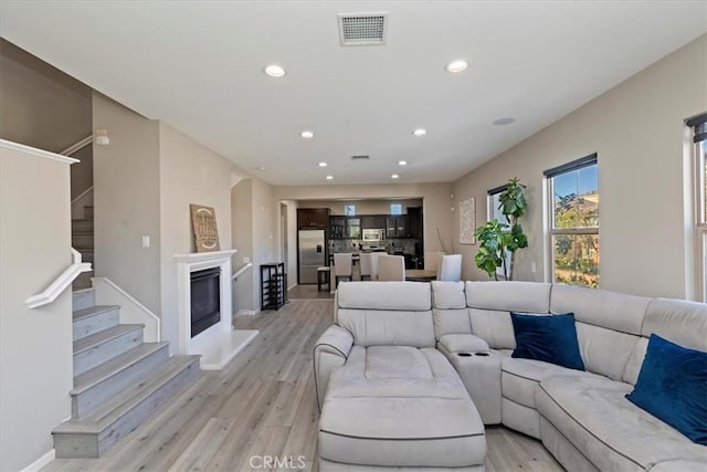 living room featuring light hardwood / wood-style floors