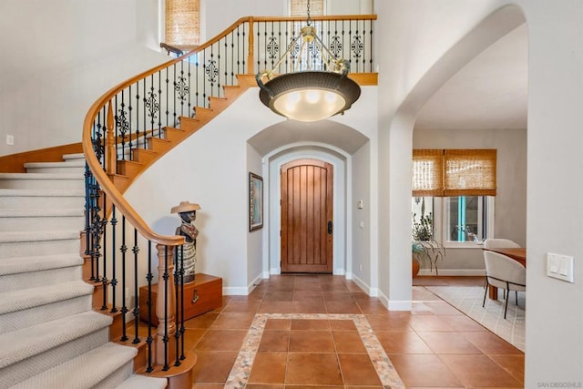 foyer featuring tile patterned flooring