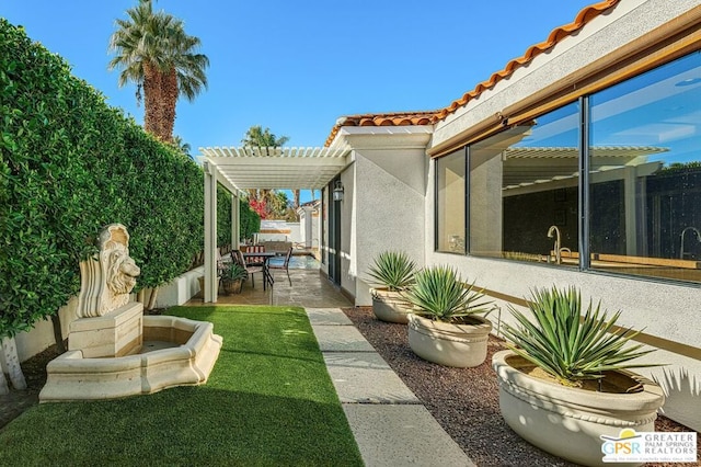 view of yard with a patio and a pergola