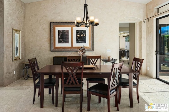 dining area with a chandelier