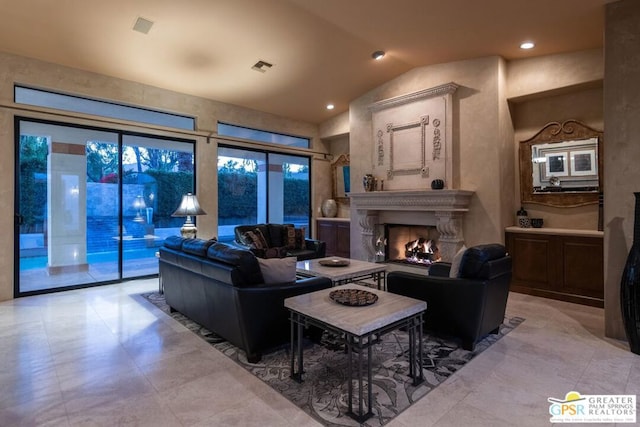 living room with lofted ceiling