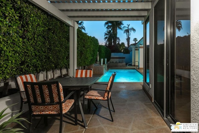 exterior space with a fenced in pool