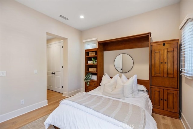 bedroom featuring light hardwood / wood-style flooring