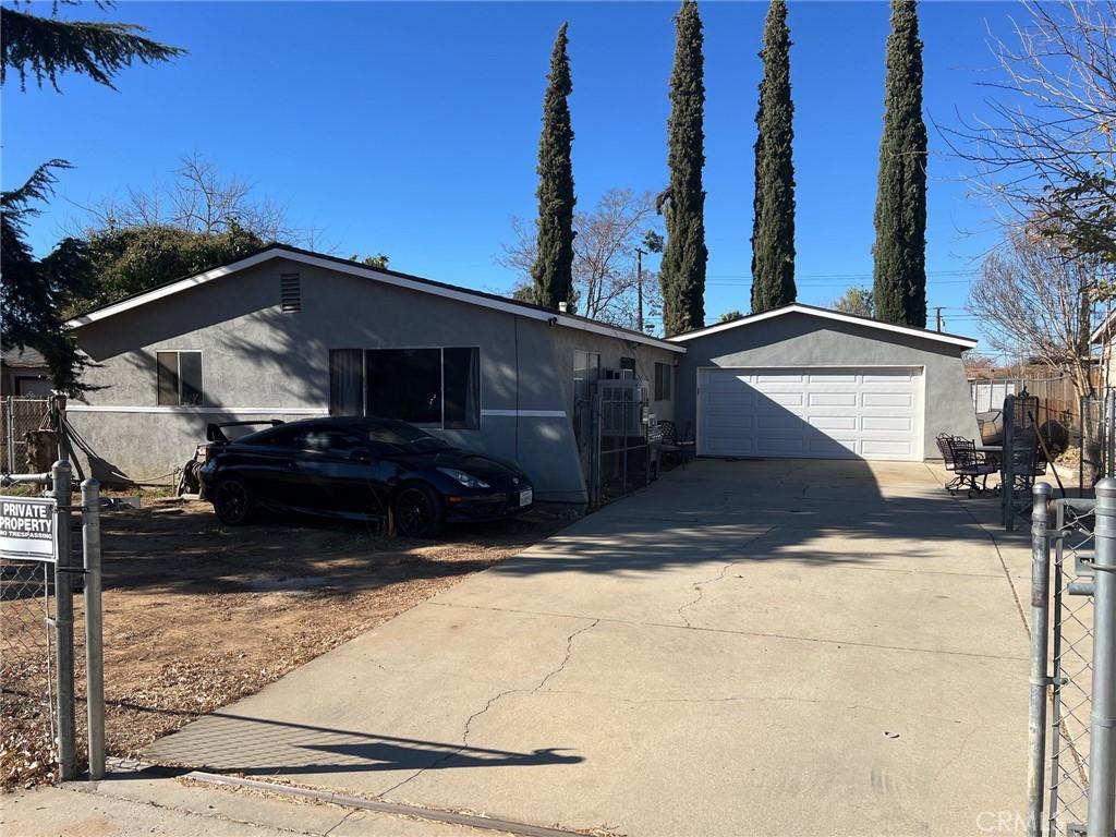 single story home with a garage