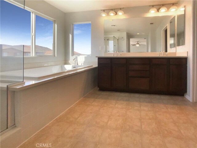 bathroom featuring vanity, tile patterned floors, ceiling fan, and independent shower and bath