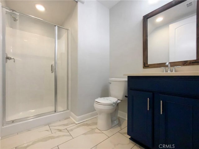 bathroom with toilet, a shower with shower door, and vanity