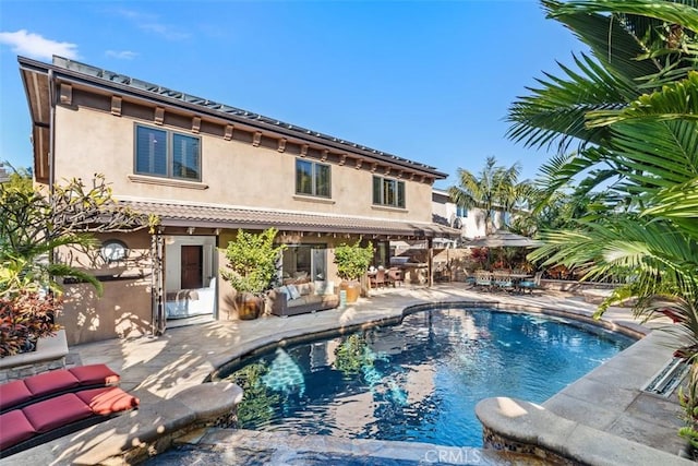 view of swimming pool featuring a patio area