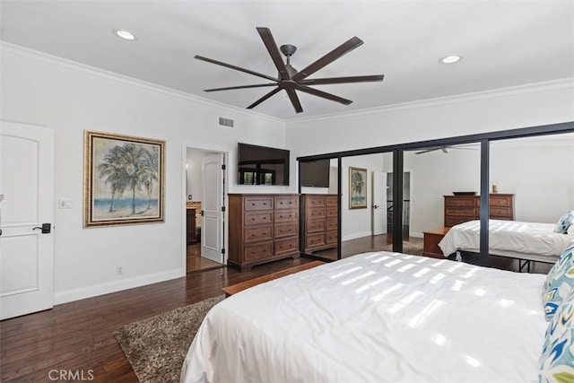 bedroom with ceiling fan, dark hardwood / wood-style flooring, and crown molding