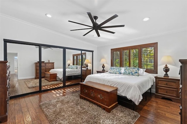 bedroom with ceiling fan, dark hardwood / wood-style flooring, and crown molding