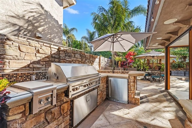 view of patio with grilling area and area for grilling