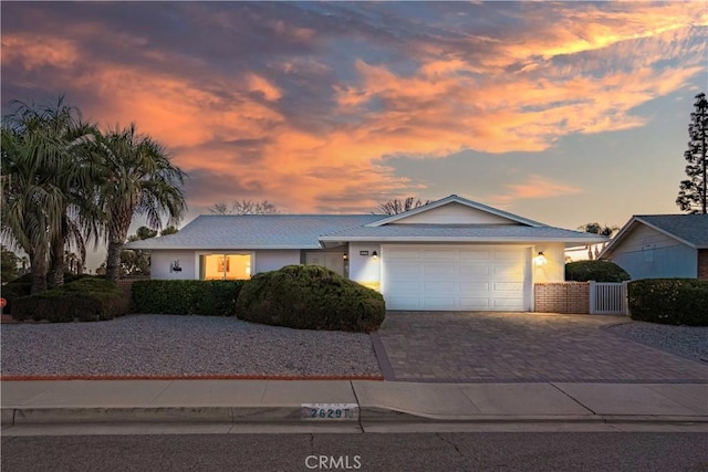 single story home with a garage