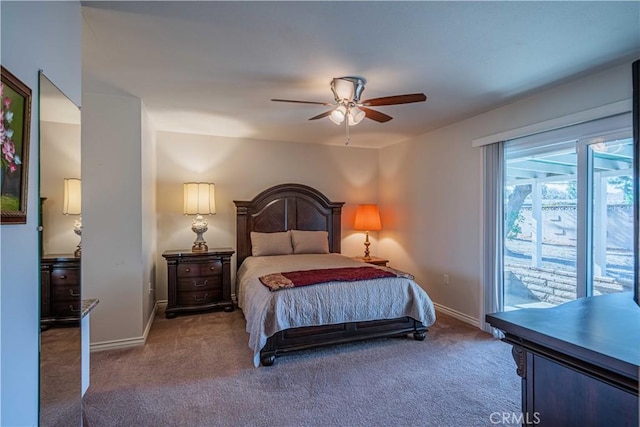 carpeted bedroom with ceiling fan and access to exterior