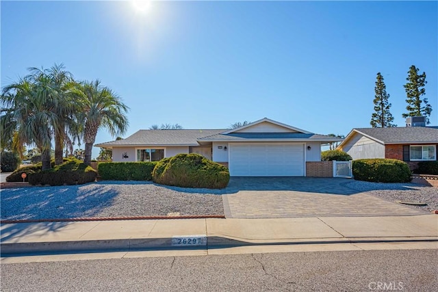 single story home featuring a garage