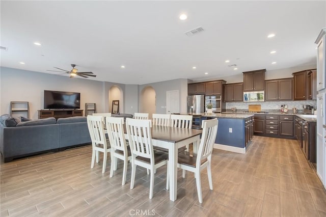 dining area featuring ceiling fan