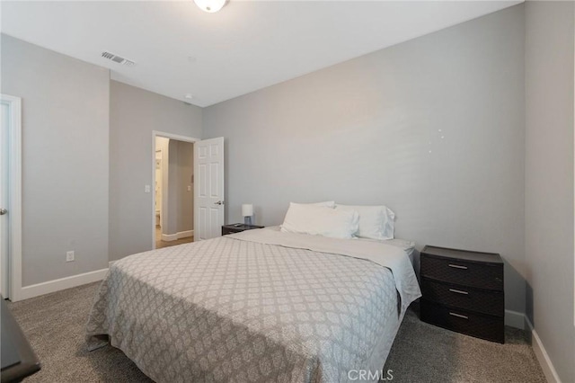 bedroom with light colored carpet