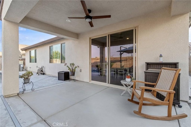 view of patio with ceiling fan