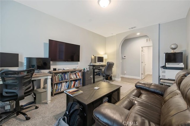 living room featuring light colored carpet