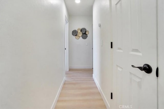 hallway featuring light wood-type flooring