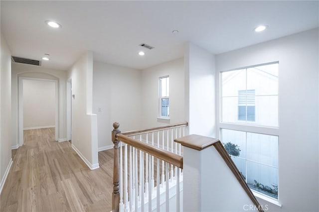 hall with light wood-type flooring