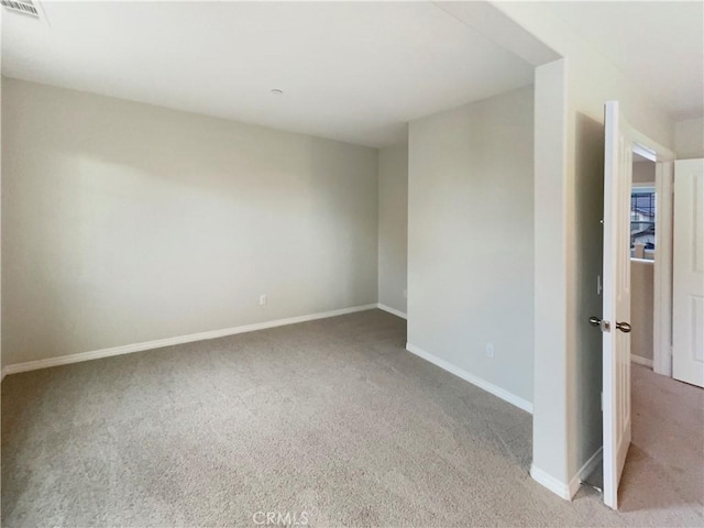 view of carpeted spare room