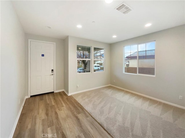 foyer entrance featuring light hardwood / wood-style floors