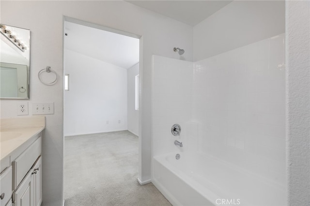 bathroom with shower / bathing tub combination and vanity