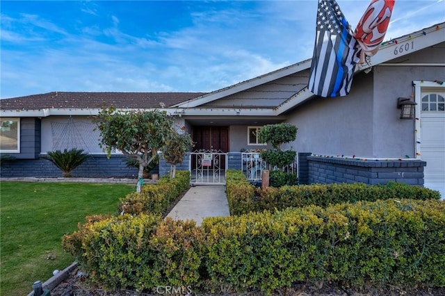 exterior space with a front yard