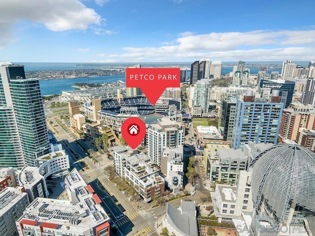 birds eye view of property featuring a water view